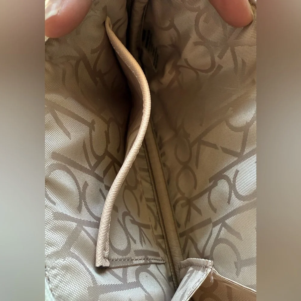 Calvin Klein Signature Pattern Wristlet in Cream and Tan